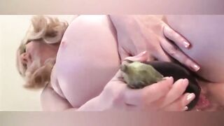 Pregnant girl fucks herself with a baby bottle