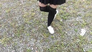 Schoolgirl in Black Knee Socks and White Shoes Show under the Skirt