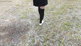 Schoolgirl in Black Knee Socks and White Shoes Show under the Skirt