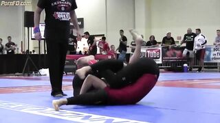 BJJ girl. Submission by triangle choke