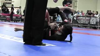 BJJ girl. Submission by triangle choke