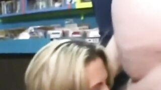 Woman randomly sucks a dirty video store clerk