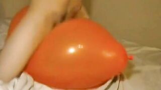 Big inflatable orange balloon humping cum