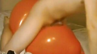 Big inflatable orange balloon humping cum