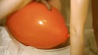 Big inflatable orange balloon humping cum