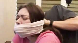 Bound and tape gagged slut gets fucked on the table