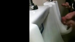 two slim dicks getting wanked at the urinals 3