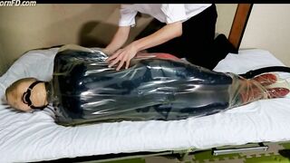 Sealed in Latex Vacbag and Vacbed