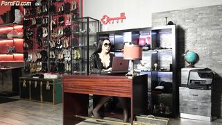 Mistress Gaia at office with strapon